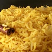 Saffron Rice · Our staple saffron Basmati rice is cooked fresh daily with cinnamon, bay leaf and other Medi...