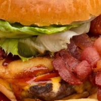 Bbq Onion Ring Burger · Grilled Burger with Bacon, BBQ Sauce, Cheese, Lettuce and Onion Rings, served with Fries