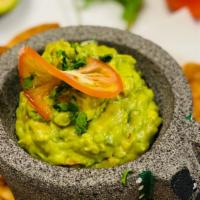 Guacamole & Chips · Served with chips.