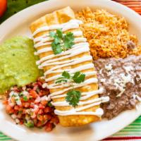 Chimichanga · Deep-fried cheese burrito, choice of steak, chicken, carnitas or al pastor, topped with sour...
