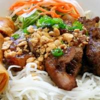 #31 Bun Thit Nuong Cha Gio · Rice noodles with grilled meat with spring roll.