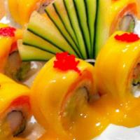 Mango Tango Roll · Crab stick and cucumber topped with salmon and mango, drizzled with mango sauce sweet.