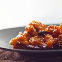Sesame Chicken · Spicy. Crispy dark meat chicken nuggets tossed in a spicy and sweet sauce with sesame seeds.