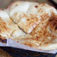 Plain Naan · Leavened bread from the clay oven.