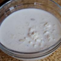 Kheer · Rice cooked in sweetened milk, nuts and raisins.