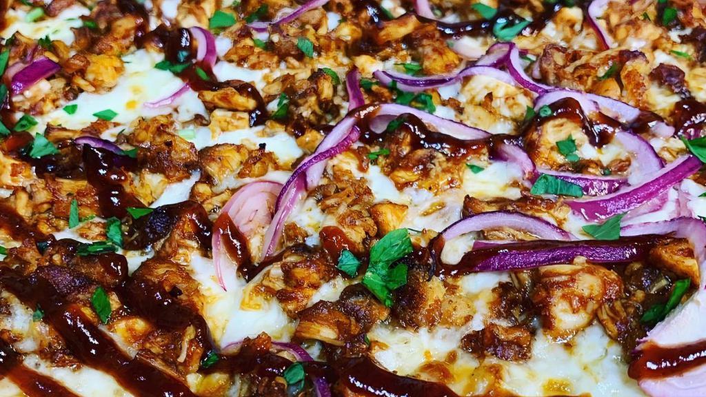 Bbq Chicken Pizza · BBQ chicken, red onions, mozzarella cheese.