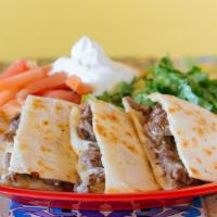 Quesadillas · All quesadillas are served with a side of sour cream, lettuce and tomatoes.