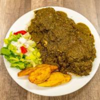 Cassava Leaf Soup With Chicken · African soup made with cassava leaf, peanuts and palm oil.