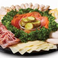 Boar'S Head Classic Deli Tray · Comes with 3 meats, 2 cheeses, pickles and GIANT brand rolls. (Serves 12 to 20).