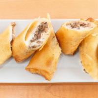Steak Cheese Egg Roll · Ingredient: onions, cheese, beef