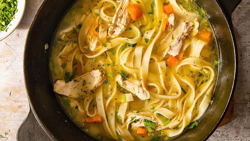 Chicken Noodle Soup · Ingredients: chicken, thick noodles, onion. Includes crispy dry noodles.