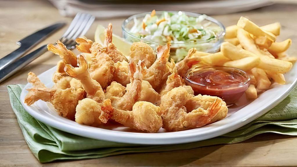 Jumbo Shrimp Platter · Served with Hush Puppies, Cole Slaw, Tartar Sauce,  and Cocktail Sauce. Comes with 14 pieces of jumbo sized shrimps