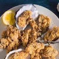 Oyster Platter · Served with Hush Puppies, Cole Slaw, Tartar Sauce, Cocktail Sauce. Comes with 10 Pieces of o...