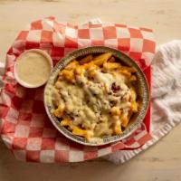 Texas Fries · Cheddar cheese, mozzarella cheese and bacon.