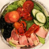 Antipasto Salad · Served with sweet peppers, hot peppers, tomatoes, onions, ham, salami and provolone cheese.