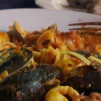Cozze E Vongole · Pei mussels and new England clams sautéed in garlic, oregano and bay leaves in a red or whit...
