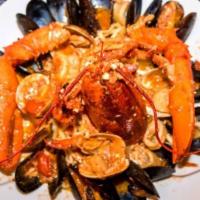 Risotto Alla Pescatora · Mussels, clams, scallops, shrimp and calamari.