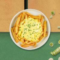 Fries With Cheese Whiz  · (Vegetarian) Idaho potato fries cooked until golden brown and topped with cheese whiz.