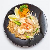 Pad Thai · A popular Thai stir fried rice noodle with egg, bean sprout, ground peanut and scallion in t...