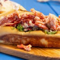 Lobster Roll · An East Coast must try favorite! It all starts with a grilled, buttered bun filled with swee...