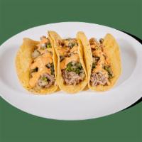 Tacos - Signature Tacos - Pulled Pork · Contains: Chipotle Sauce, Add Avocado, Pulled Pork, Cilantro Relish
