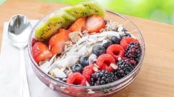 Purple Honey Bowl · Pureed acai berries, topped with bananas, blueberries, granola, drizzled with manuka honey a...
