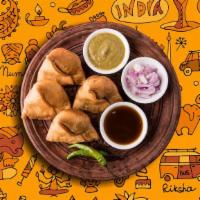 Samosa Samurai · Triangle shaped deep fried pastry dumplings filled with spiced potatoes and vegetables