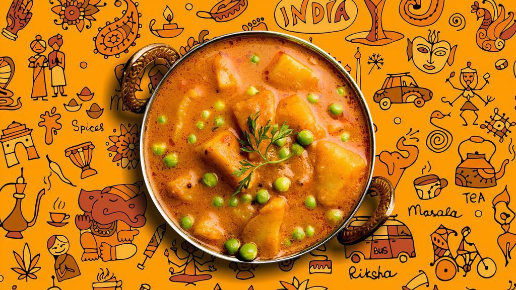 Potato & Peas · Peas and potatoes, simmered to perfection in an onion, tomato and Indian masala curry, served with a side of our aromatic basmati rice