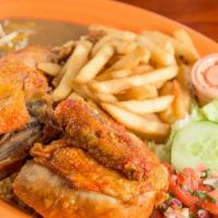 Fried Chicken · Served with rice, beans, fries and a salad.