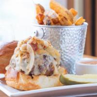 Stonerose Burger · Premium gold Angus beef, bacon, onions, and cooper sharp on toasted brioche served with hand...