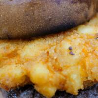 Mac & Cheese Burger · Our Juicy 6oz burger topped with our creamy fried macaroni and cheese. Delicious as is or ad...