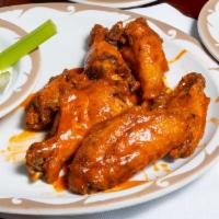 Jumbo Buffalo Wings · All orders of wings are served with bleu cheese, roll and choice of sauce.