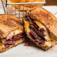 Moriarty'S Reuben · Lean corned beef, pastrami, sauerkraut, Russian dressing, served on marble rye.