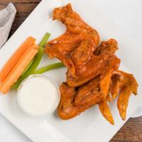 Chicken Wings · Your choice of moriarty's signature sauce, hot, sweet Thai chili, or honey BBQ.