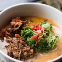 Red Miso Ramen · Red miso tonkotsu broth, chashu pork, greens, soft poached egg, pickled ginger, scallions