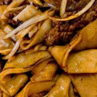 Beef Chow Fun · Flat rice noodles.
