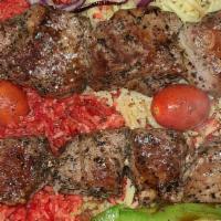 Shish Kabob · Beef, chicken, shrimp or lamb with vegetables marinated and grilled over an open flame and s...