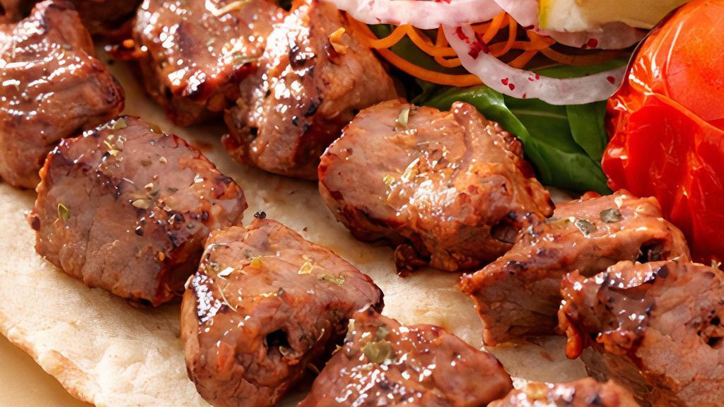 Halal Lamb Platters · serve with Halal lamb, chickpeas,fresh rice ,salad,and our secret sauce marinated and cook on grill