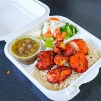 Halal Chicken Platters · serve with fresh halal chicken ,salad,fresh made rice ,chickpeas,and our secret sauce marina...