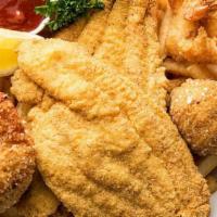 Seafood Platter · One fish, two crab cakes, five jumbo shrimp, French fries and house salad.
