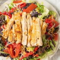 Chicken Quesadilla Salad · Fresh spring mix, grilled cajun chicken, blended cheese, topped with tomato, onion, roasted ...