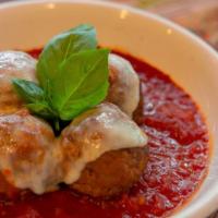 Meatball Parmesan · Meatballs in marinara, topped with mozzarella and parmesan.