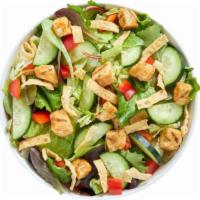 Asian Crispy Chicken Salad · Features a base of our super greens blend. It is served with sweet chili crispy chicken, man...