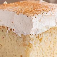 Tres Leches · Traditional cake floating in sweet creamy milk.