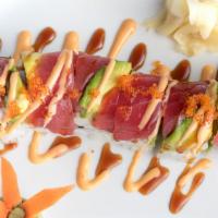 Spicy Red Dragon Maki · Raw. Crabstick, avocado, cucumber topped with fresh tuna and spicy special sauce with red to...