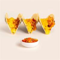 Breakfast Cheese Taco · A breakfast taco but with even more cheese. Scrambled eggs, salsa, and your choice of protei...