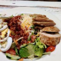 Cobb Salad · Garden salad with boiled egg, bacon, jack and cheddar, grilled chicken.