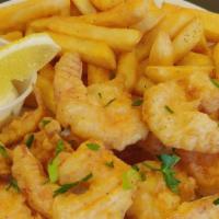 Shrimp Basket · Marinated shrimp battered and deep fried, served with French fries and tartar sauce.