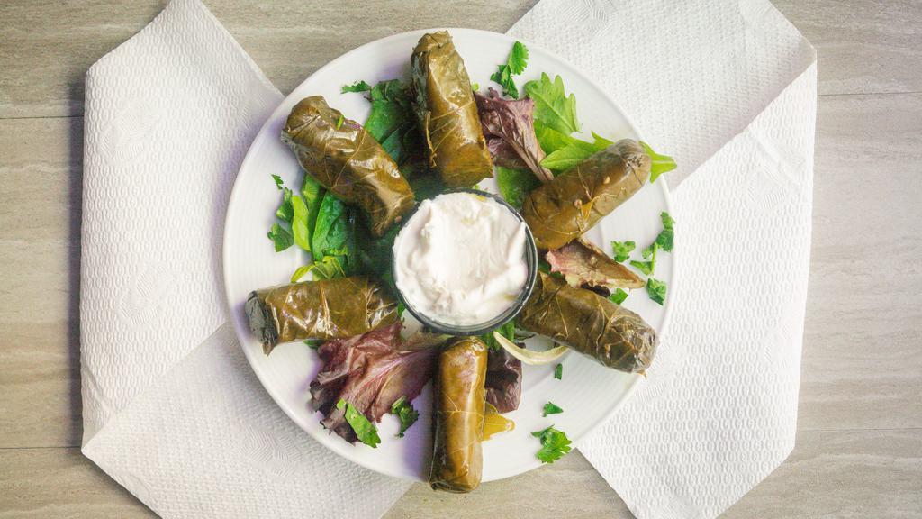 Grape Leaves · Served with six pieces.