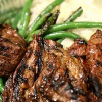 Bbq Steak Tips · Aged Angus Tips marinated in our secret family recipe BBQ sauce, served with red bliss mashe...
